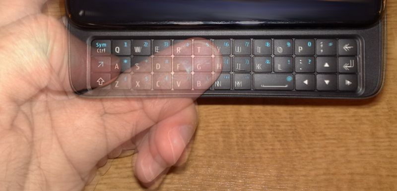 Thumb stretching to cover its half of the N900 keyboard