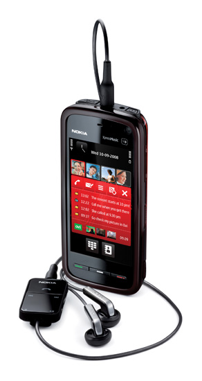 Nokia 5800 with headphones attached