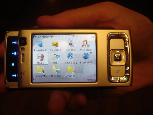 Rafe holding a Nokia N95 Rafe holding a Nokia N95