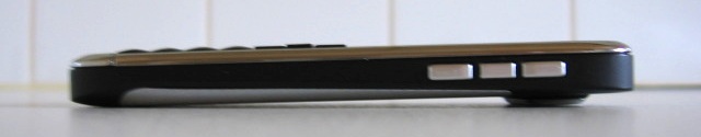 E72 on its back from right side. Showing right side buttons, and lift from camera.