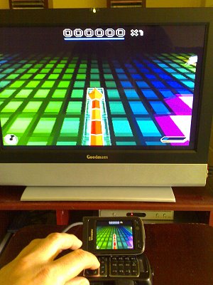 A Nokia N93 running Snakes connected to a television through the TV Out socket